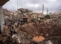 Israel warns Lebanon of ’heavy price’ as bombardment pounds Beirut suburbs