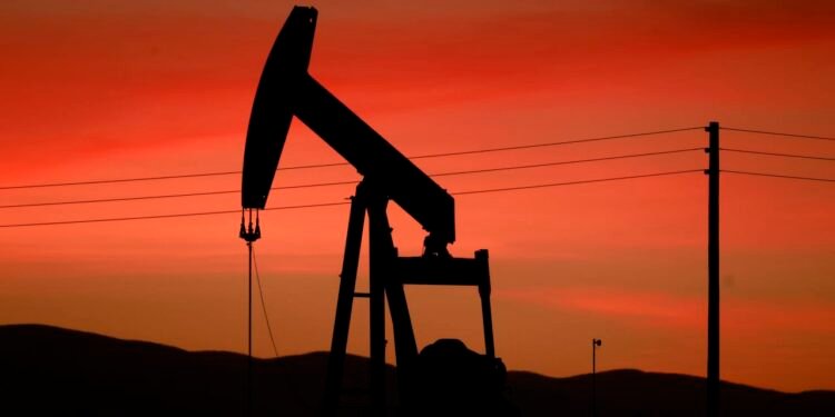 Oil futures rise as traders await decision on reserves