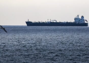 Oil prices gain for the month but fall for the session on hopes that an end to the Iran war may be near