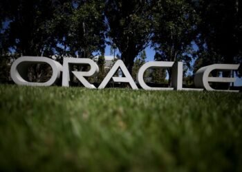 Oracle’s stock rises as company reportedly begins thousands of job cuts