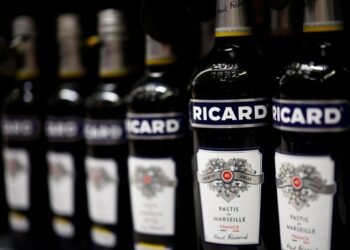 Pernod-Ricard shares pare losses as market digests merger talks 