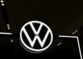 Volkswagen stung by tariffs, China battle as profit halves