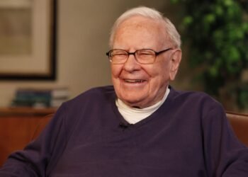 Warren Buffett says he's still making investment calls at Berkshire, flags 'tiny' buy