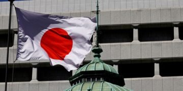 BOJ keeps rates steady but 3 board members dissent, call for hike