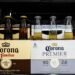 Corona brewer says shoppers are going for cheaper beer and wine, as it grows more cautious on demand
