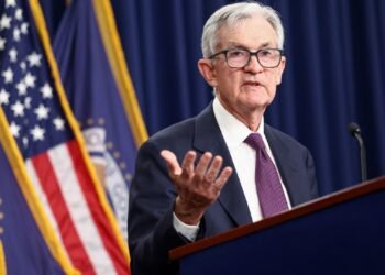 Fed holds rates steady amid dissent
