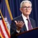 Fed holds rates steady amid dissent