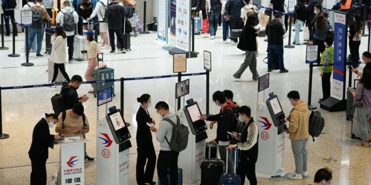 Flight cancellations and high fuel prices help keep Chinese close to home for May holidays