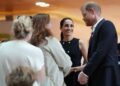 Prince Harry and Meghan arrive in Australia to a muted welcome