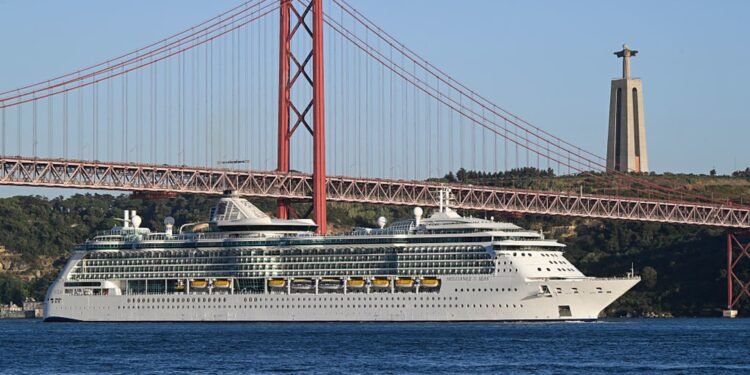 Stocks making the biggest moves midday: RCL, XOM, CRML, NFLX