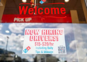 Stocks making the biggest moves premarket: QCOM, DPZ, ADBE