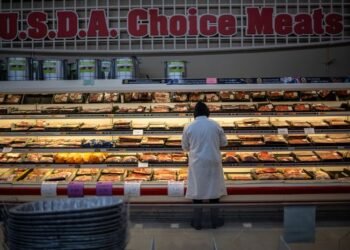 US consumer confidence unexpectedly improves, but higher gasoline prices still a worry