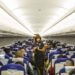 Why Do Flight Attendants Sit on Their Hands?