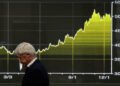 Bond yields, oil fall amid hopes for Iran deal; stocks end up with chip shares