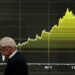 Bond yields, oil fall amid hopes for Iran deal; stocks end up with chip shares