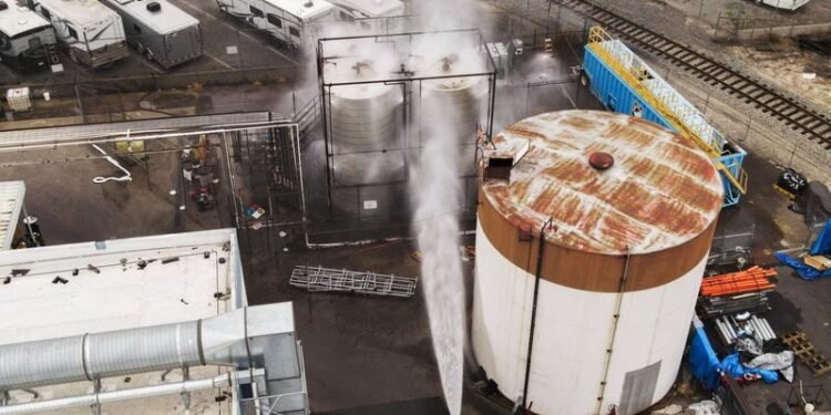 California chemical tank heating up after evacuation in LA suburb, fire official says