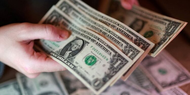 Dollar wobbles as markets cling to hopes for Middle East peace deal