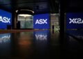 Exchange operator ASX sinks most in more than a decade on tech-driven cost surge