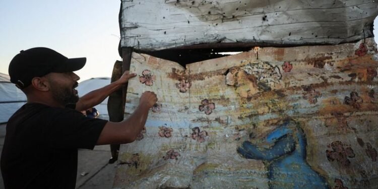 Israeli strike kills at least two at Gaza seaport cafe, medics say