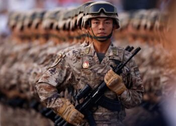 Japan refutes ’new militarism’, accuses China of rapidly arming