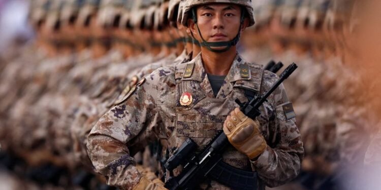 Japan refutes ’new militarism’, accuses China of rapidly arming