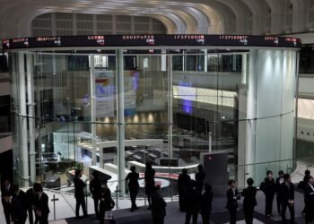 Japan’s Nikkei hits record high as chip-related shares jump