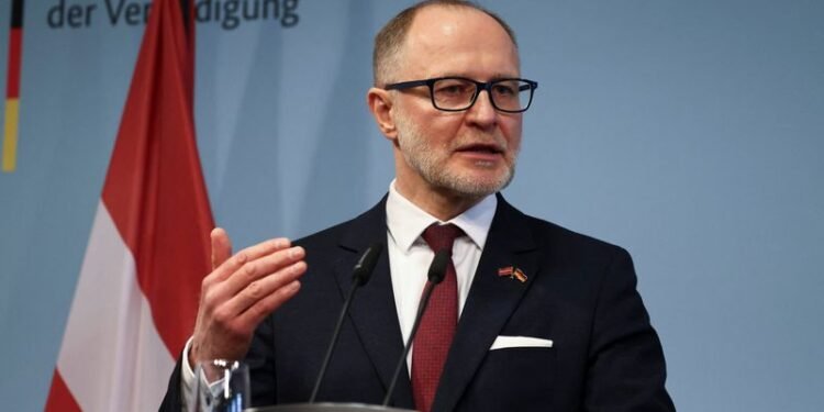 Latvian defence minister resigns after Ukrainian drones hit oil tanks