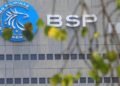 Philippine central bank governor says it is considering off-cycle rate hike