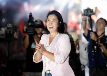 Right-wing Fujimori holds narrow lead one week before Peru presidential runoff, polls show