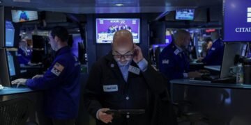S&P 500, Nasdaq boosted by chips to record closing highs
