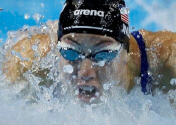 Swimming-American Walsh improves own 100m butterfly world record for third time in a year