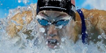 Swimming-American Walsh improves own 100m butterfly world record for third time in a year