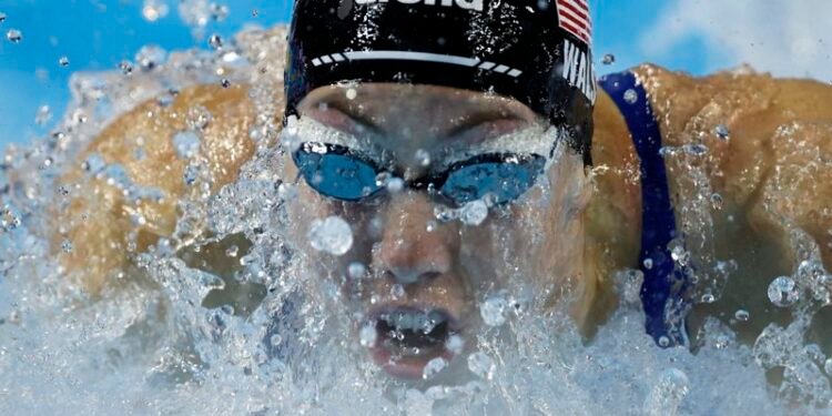 Swimming-American Walsh improves own 100m butterfly world record for third time in a year