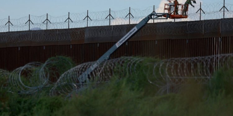 US judge blocks key parts of Texas migrant arrest law