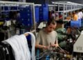 China May factory activity expands for sixth month as price pressures ease, private PMI shows