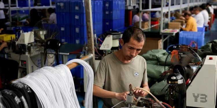 China May factory activity expands for sixth month as price pressures ease, private PMI shows