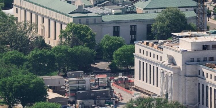 Fed holds steady in Warsh’s debut; analysts see hawkish shift