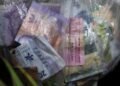 Indonesia central bank, finance minister agree to boost asset yields to aid rupiah