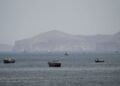 Oil slips again as US, Iran sign peace deal
