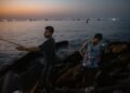 Oil tankers are being lured back into the Strait of Hormuz by big payouts
