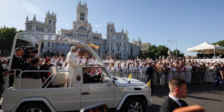 Pope Leo tells 1.2 million crowd in Madrid that God stands with the poor