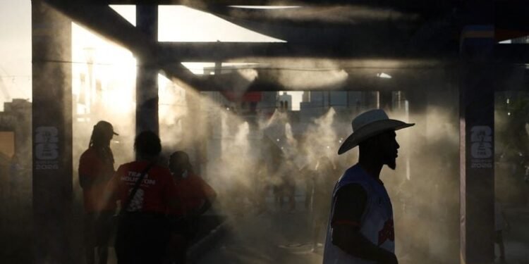 Soccer-Beating the heat no problem for World Cup fans in sweltering Houston