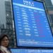 Stocks edge lower as dollar rises to one-year high