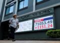 Stocks turn lower as US-Iran talks hit early snag; oil erase early losses