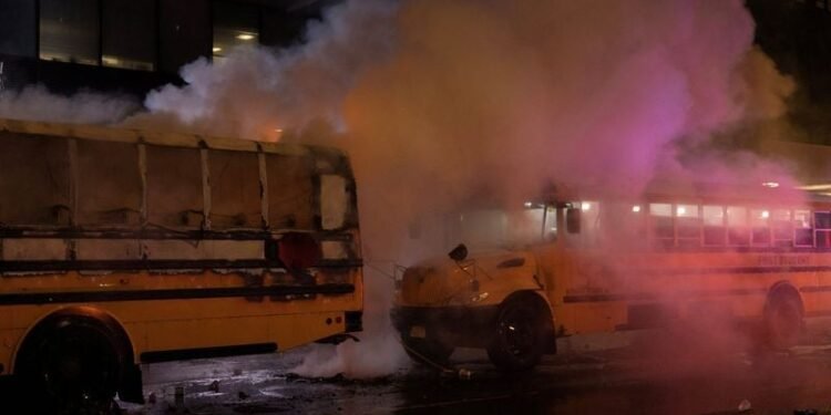 World Cup bus set alight as chaotic celebrations erupt in Manhattan after Knicks win
