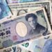 Yen pinned near intervention zone; dollar boosted by Gulf tensions