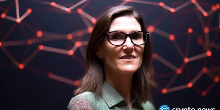 Cathie Wood snaps up $38m Tesla dip after Musk stock rout - 1