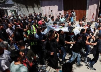 Gazans mourn aid worker killed by Israel who brought them the World Cup