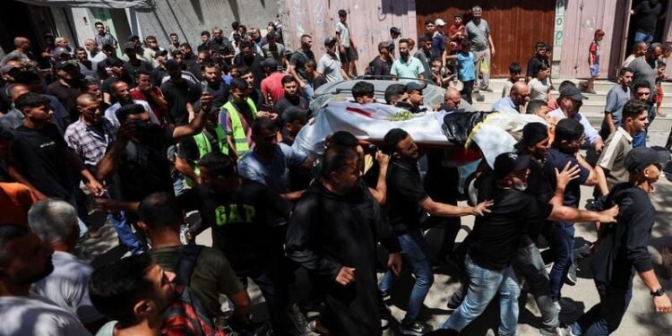 Gazans mourn aid worker killed by Israel who brought them the World Cup
