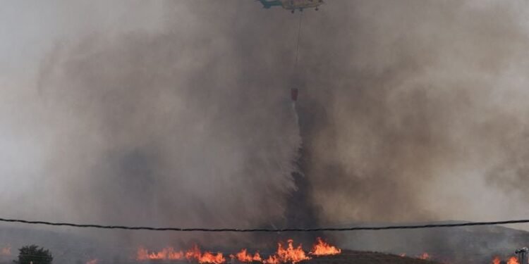 Spanish wildfires claim 13th victim as British woman, 93, dies of injuries